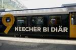 Detailanischt auf dem RBDe 560 414 von RegionAlps mit dem Slogan des TV Senders Kanal 9 (Walliserdeutsch; Näher bei dir) am 27.7.22 im Bahnhof Brig.