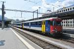 RBe 540 039-5 mit Ersatz IC 10784 in Chur, 13.07.2013.