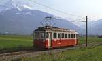 In der Rhoneebene ist der ex-Sernftalbahn-BDe 4/4 111 der Chemin de Fer Aigle-Ollon-Monthey-Champery (AOMC) im Mai 1980 zwischen St.