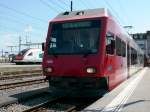 Der meterspurige Travys Triebwagen 2000 Be2/6 steht hier abfahrbereit um von Yverdon nach Sainte-Croix zu fahren.