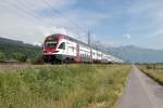 Die RABe 511 022 von Sargans nach Chur am 12.06.2013 bei Sevelen