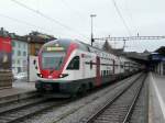 SBB - Triebzug RABe 511 122 als RE nach Schaffhausen bei der ausfahrt aus dem HB Zürich am 16.02.2014