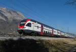 „RHEINTAL-EXPRESS“ RE 3815 auf der Fahrt von (Wil) St. Gallen nach Chur am 07.03.2014 bei Sennwald.