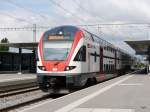 SBB - Triebzüge RABe 511 117 bei der durchfahrt  der Haltestelle Peilly-Malley am 26.04.2014