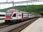 SBB - Triebzüge RABe 511 123-7 mit RABe 511 110 im Bahnhof Biel als RE nach Bern am 02.05.2015