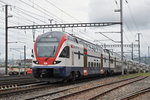 RABe 511 009 durchfährt den Bahnhof Muttenz. Die Aufnahme stammt vom 16.04.2016.