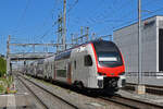 RABe 512 054-3 KISS durchfährt am 25.04.2026 den Bahnhof Muttenz.