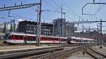 ABe 130  SPATZ  und RABe 520  Stadler GTW  bei der Einfahrt in den Bahnhof Luzern, Aufgenommen am 08.08.2012