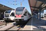 RABe 526 770-3 (Stadler GTW) der Thurbo AG als S 14 nach Kreuzlingen (CH) trifft auf RABe 521 207 (Stadler FLIRT) der SBB GmbH (SBB) als SBB87684  Seehas  nach Engen in ihrem Startbahnhof Konstanz.