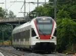 Flirt RABe 521 014-1 bei der Einfahrt im Bahnhof Dornach am 28.07.10