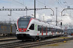 Nach einem Ereignis im Bahnhof Muttenz werden alle Züge durch den Güterbahnhof Muttenz umgeleitet. Hier durchfährt der RABe 521 014 auf der S3 den Güterbahnhof. Die Aufnahme stammt vom 06.02.2017.
