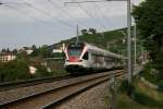 RABe 523 027 unterwegs als S1 12128 (Villeneuve - Yverdon-les-Bains) am 11.8.2010 zwischen Epesses und Cully. 