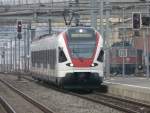 SBB - Triebzug RABe 523 019 bei der einfahrt im Bahnhof Renens am 11.01.2014