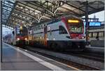 In Lausanne steht der SBB RABe 511 103 als RE nach Annemasse und der SBB RABe 523 104 als S1 nach Grandson.