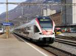 SBB/TILO - Einfahrt des Triebwagen RABe 524 108 im Bahnhof Giubiasco am 27.02.2015