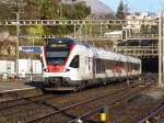 SBB / TILO - Triebzug RABe 524 014 bei der einfahrt im Bahnhof Lugano am 25.12.2015