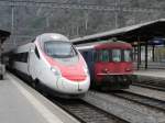 SBB - ETR 610 110-4 neben BDt Steuerwagen im Bahnhof Brig am 08.04.2012