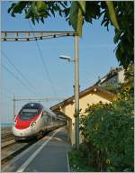 SBB ETR 610 als EC 37 auf der Fahrt nach Venezia bei der Durchfahrt in St-Saphorin.
31. August 2013