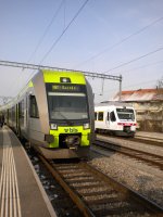 Ltschberger RABe 535 112 und NINA RABe 525 38 in Kerzers. 23.01.2010