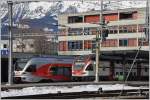 Begegnung in Buchs SG.RE4869 mit 511 019 und S4 23450 mit 526 050-0. (27.01.2016)