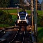 RABe 526 744-8 als S14 nach Konstanz in der letzten Abendsonne am Berg in Berg am 9.9.2014