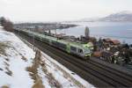 Vier Ltschberger mit dem RABe 535 102-8 fahren am 20.2.10 von Thun Richtung Spiez.