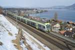 RABe 535 103-6 und RABe 535 112-7 fahren am 20.2.10 als RE 3163 von Einigen Richtung Spiez.