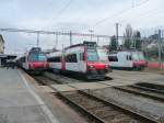 SBB - RBDe 4/4 560 Domino Treff im Bahnhof von Payerne am 26.02.2011