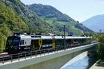 RegionAlps RBDe 560 414 mit der Kanal 9 Werbung als Regio nach St-Gingolph am 13.8.22 beim Überqueren der Rottenbrücke in Leuk.