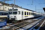 BLS RBDe 565 735 mit der White Bull Werbung wartet in Payerne auf die Ausfahrt mach Murten.
Aufgenommen an einem sonnigen  13.02.2009.