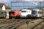 100 Jahre Rhtische Bahn.Paralleleinfahrt von Ge 6/6 II,ICE der DB (Prototyp)und RAe Euro City  Gottardo  am 20.Mai 1989 in Chur  (Archiv P.Walter)