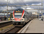 SBB - Triebzug RABe 511 019 unterwegs auf der S1 nach Lausanne bei der einfahrt im Bahnhof von Yverdon les Bains am 23.09.019
