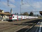 SBB - Triebzug RABe 511 023-9 unterwegs als RE nach Wettingen bei der durchfahrt im Bahnhof Rupperswil am 26.10.2014