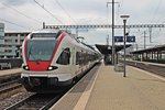 Ausfahrt am 14.05.2015 von RABe 521 014 als S3 nach Olten aus dem Bahnhof Pratteln.