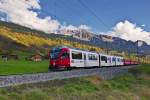 ABe 8/12  3512 fährt mit dem Re nach Landquart zu Tale.Bild Küblis vom 9.10.2015