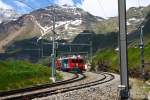 RhB ABe4/4 #55 und #54 vor Bernina-Express in Alp Gr�m - 28/06/2011