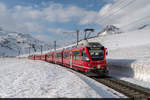 Am 07.03.2021 ist RhB ABe 8/12 3501 unterwegs am Bernina als Regio 1641 von St.