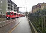 RhB_Chur-Arosa__Zug der Arosa-Bahn mit ABe 8/12 Nr.3513 [ Allegra  Zweispannungs-Triebzug (ZTZ)] vom Bahnhof kommend als Straßenbahn in Chur.__23-02-2024