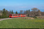 Be 4/4 204 ist am 17.04.2021 auf der NStCM unterwegs und konnte hier vor dem Bahnhof Le Muids bei Arzier-Le Muids aufgenommen werden.