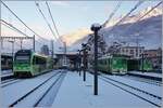 Im frisch verschneiten Bahnhof von Aigle wartet der TPC Beh 2/6 544  L'Éperon  und der TPC ASD BDe 4/4 403 auf die Abfahrt in Richtung Champéry bzw.