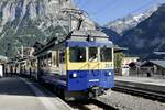 Die drei ABeh 4/4 II 313–311 stehen am 19.9.25 im Bahnhof Grindelwald.