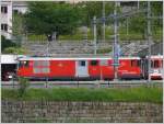 R835 mit Deh 4/4 I 22  St.Niklaus  ex BVZ wartet in Diesntis auf die Abfahrt.