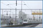 Whrend eines kurzen Schneeschauers erreicht ein Cisalpino ETR 470 den Hauptbahnhof Zrich.