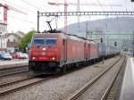 Crossrail - 185 596-4 und  185 595-6 vor Güterzug bei der durchfahrt in Sissach am 06.04.2014