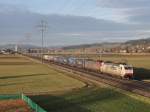 Crossrail BR 186 und 185 mit  Walti -Zug bei Kiesen am 08.01.2011