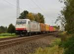 Die Crossrail 185 580-8 ist hier bei Herrather Linde mit einem Containerzug gen Aachen fahrend am Sonntag den 12.10.2014