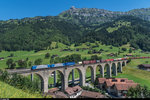 Am 20. Juli 2016 machte ich einen Ausflug an die Lötschberg-Nordrampe. Trotz des Basistunnels, war im Güterverkehr auf der Bergstrecke recht viel los.<br>
Zwei Loks der Baureihe 185 fahren mit einem Crossrail-UKV-Zug bei Frutigen über das Kanderviadukt nordwärts.