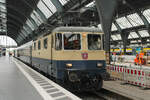 Re 421 387  mit dem um 20 Minuten verfr�hten DZ 13404 (Luzern - Frankfurt) im Karlsruher Hauptbahnhof (19.05.2026)