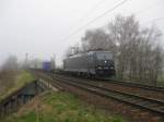 185 569-1 der RTS Rail Traction zieht am 1.04.09 einen Containerzug durch Hamburg-Moorburg Richtung Hafen.