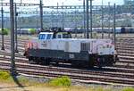 Rhomberg Sersa Alstom Prima H4 Aem 940 004-5 am 09.07.26 in Lausanne Rbf vom einen Gehweg aus fotografiert